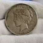 1934 S US Peace Silver Dollar $1 Fine + (Tape Residue)