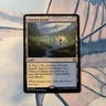 Wizards of the Coast Flooded Strand Khans of Tarkir Rare Land Regular English NM