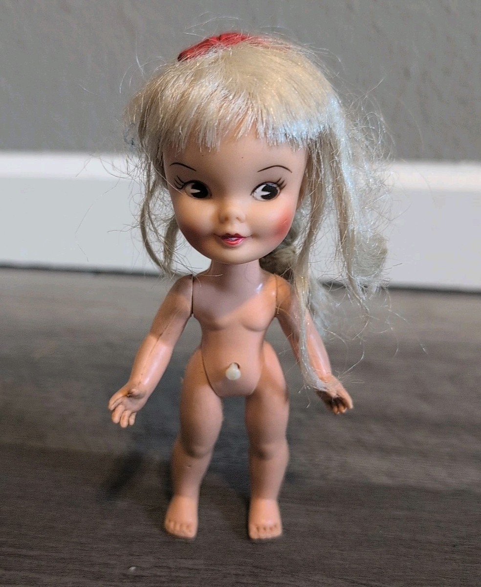 1960s Remco Heidi Pocketbook Doll in Red Dress Swinging Arm Push