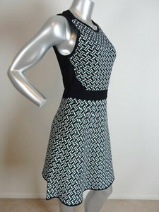 emerald green fit and flare dress