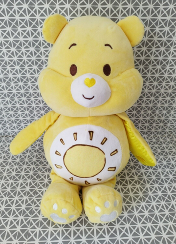 doudou bisounours jaune soleil care bears