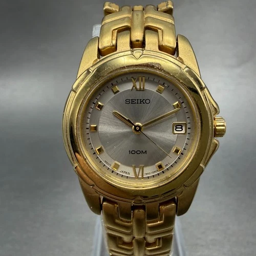 Seiko Watch Women 26mm Silver Dial Gold Tone Date Round 7N82-0AM0 New Battery