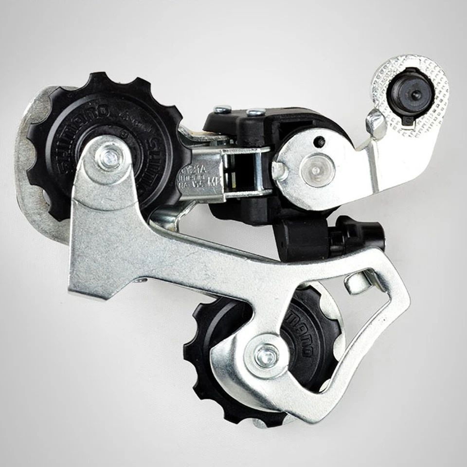 Desviador trasero Shimano RD-TY21 6/7 velocidades bicicleta de montaña SS plateado EE. UU. NUEVO Foto 2 de 2