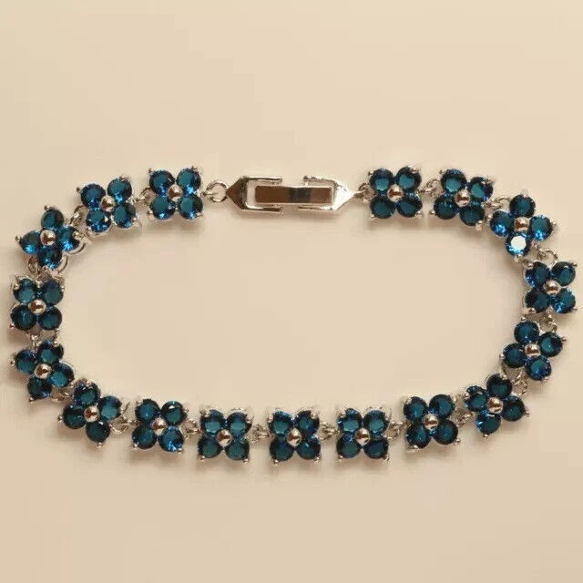 Теннисный браслет 7 карат круглый созданный в лаборатории с голубым топазом и цветком покрытие белым золотом 14 карат - Изображение 3 из 4