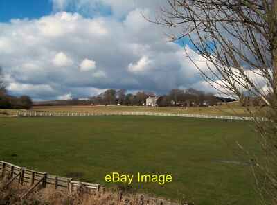 Photo 12x8 Cricket Ground at Brookhouse A damp pitch pictured here on a fr c2013