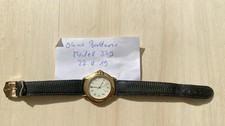 Yves Saint Laurent Damen Uhr Modell 379 Quarz vergoldet Leder schwarz 