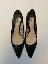 Prada kitten heels, black leather, embossed. Made in Italy