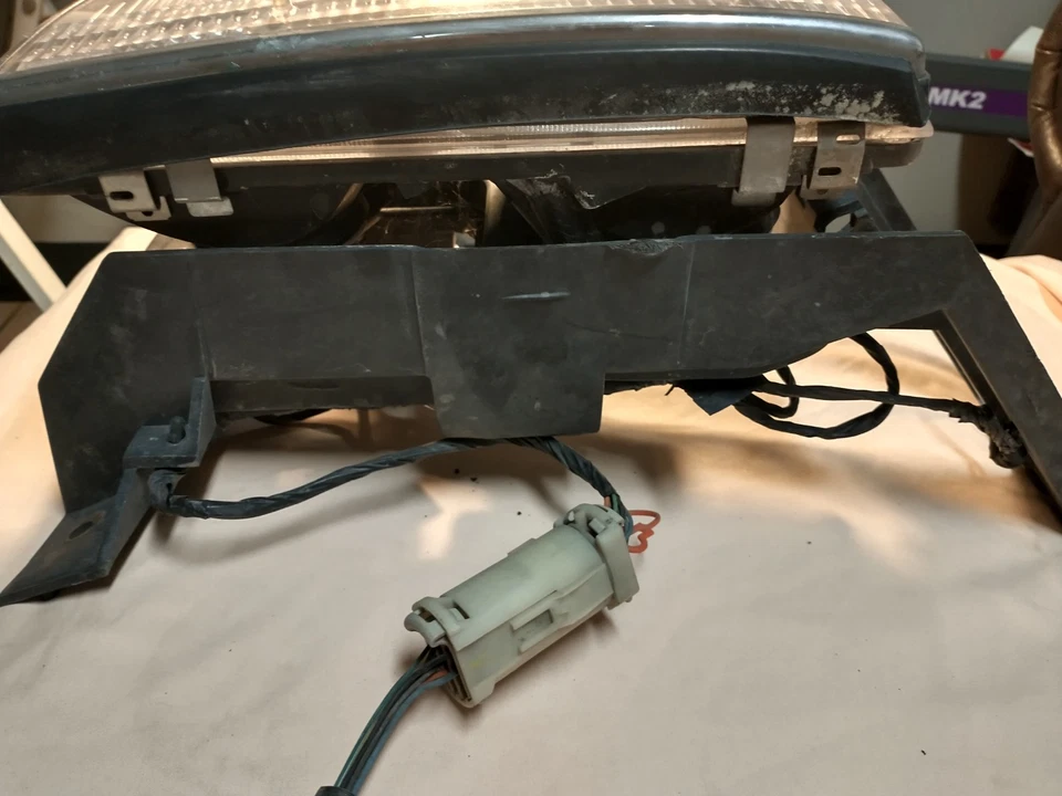 Faro conductor izquierdo izquierdo Cadillac Deville 1994-1996 con soporte y extremos de arnés Foto 2 de 4