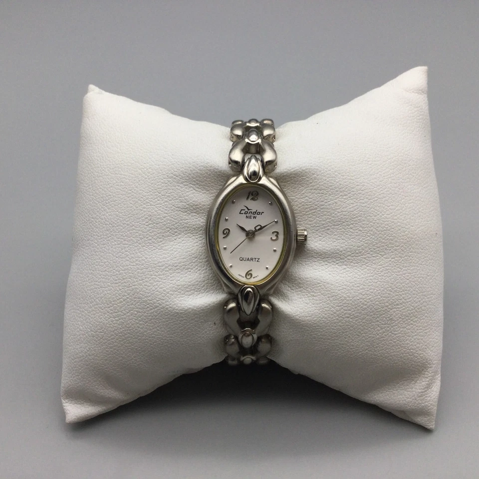 Reloj Condor para mujer 18mm Dial ovalado de tono plateado Acero inoxidable Nueva batería 5.25" Foto 2 de 4