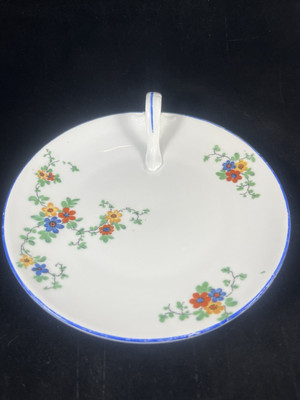 Antique Porzellanfabrik Kahla floral candy dish with blue edging