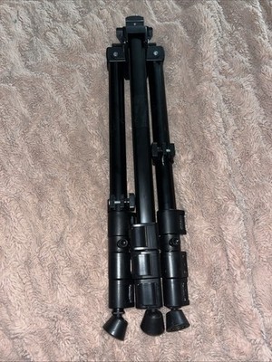Black unbranded tripod easel