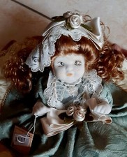 Bambola in ceramica porcellana collezione vintage