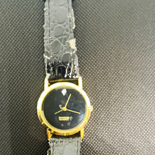 Diamond Quartz Quartz Dress Watch Black Dial Gold Tone Case Black Leather