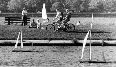 Riders a bicycle built two pass model yachts Storrow Lagoon s- Boston Old Photo