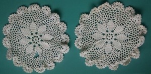 Doilies-A Pair of 7 1/2" Round Beige 'Poinsettia' Crocheted Doilies - 1 has hole