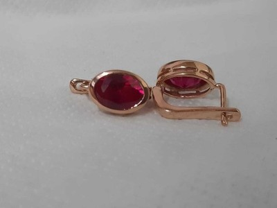2Ct Oval Cut Simulated Pink Ruby Stud Earrings In 14K Rose Gold Plated Silver