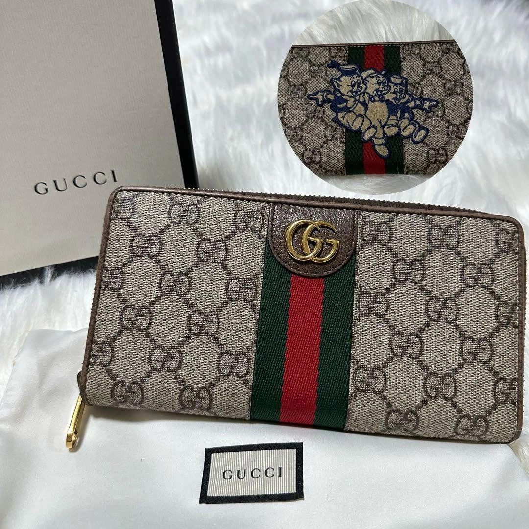 Authentique portefeuille Gucci couleur marron L10,5 cm L19 cm GG Supreme Sherry Line Ophidia