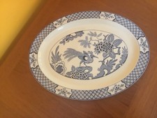 yuan woodsware oval meat plate measures 14 inches in length