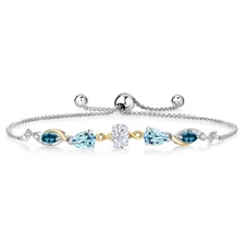 925 Silver and 10K Yellow Gold White Moissanite Sky Blue Topaz London Blue