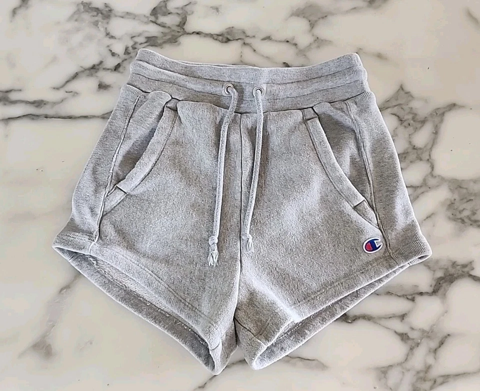 Pantalones Cortos Vintage Champion Gruesos Tejido Inverso Extra Pequeños SPELLOUT XS Gris Usados en Excelente Condición  Foto 2 de 4
