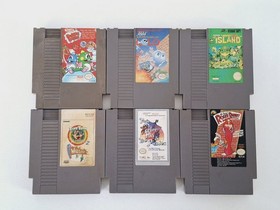 Lotto di 24 giochi Nintendo NES; Bubble Bobble, Adventure Island, Lolo, Paperboy