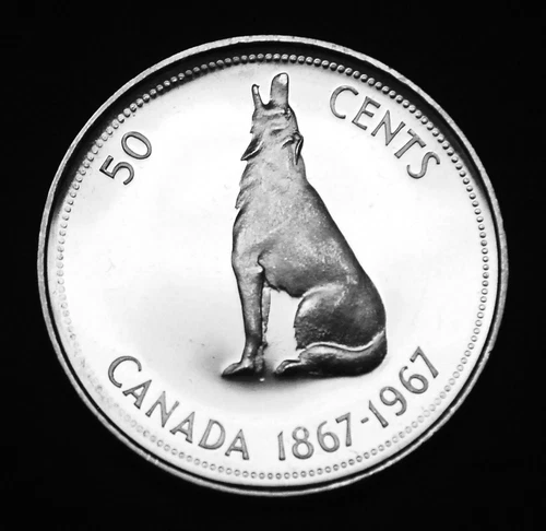 1967 50¢ silver in original mint cellophane UNC and MS and flawless