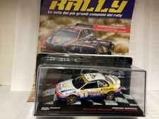IXO Subaru Impreza 555 Rally Poland 1997 1:43 Die-Cast + Booklet