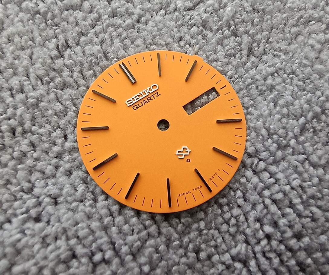 GENUINE NOS SEIKO QUARTZ SQ 7546-8470 ORANGE DIALVERY RARE