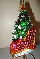 Radko TRIMMED TO TRAVEL Tree in Pink Sleigh Glass Christmas Ornament 00-1437-0