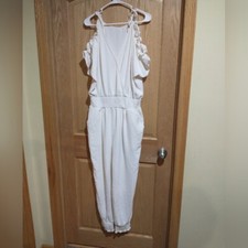 Jumpsuit size Large V-neck pockets elastic waist peekaboo shoulder cream NWOT