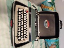 1960 Smith Corona Typewriter in a carrying case thumbnail