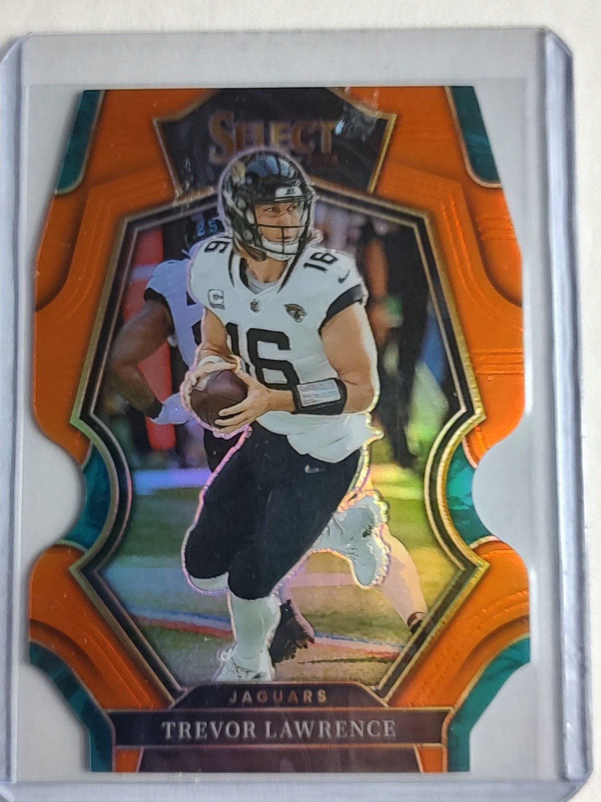 2022 Select NFL Trevor Lawrence #145 Premier Level Orange Die Cut /199 Jaguars
