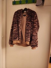 Veste fourrure léopard avec capuche