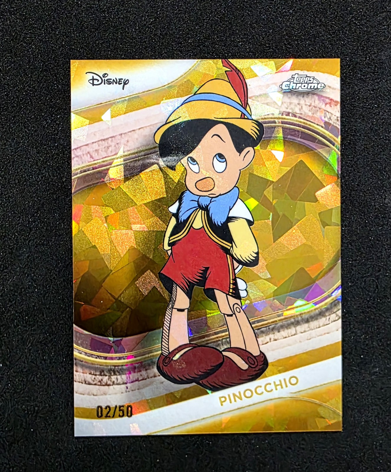 2025 Topps Chrome Sapphire Edition Disney #85 Pinocchio Gold Sapphire 02/50