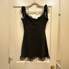 Little black dress with tie straps and ruffles size Small