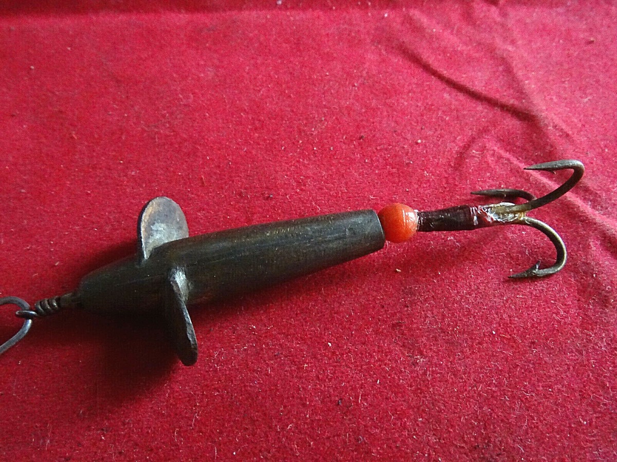 19th century old fishing lures Collection of Painted Wooden and Metal c.1940 The set of books arranges for the individual and company lures makers to appear in alphabetical order The Fun and Artistry of