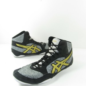 white and gold wrestling shoes