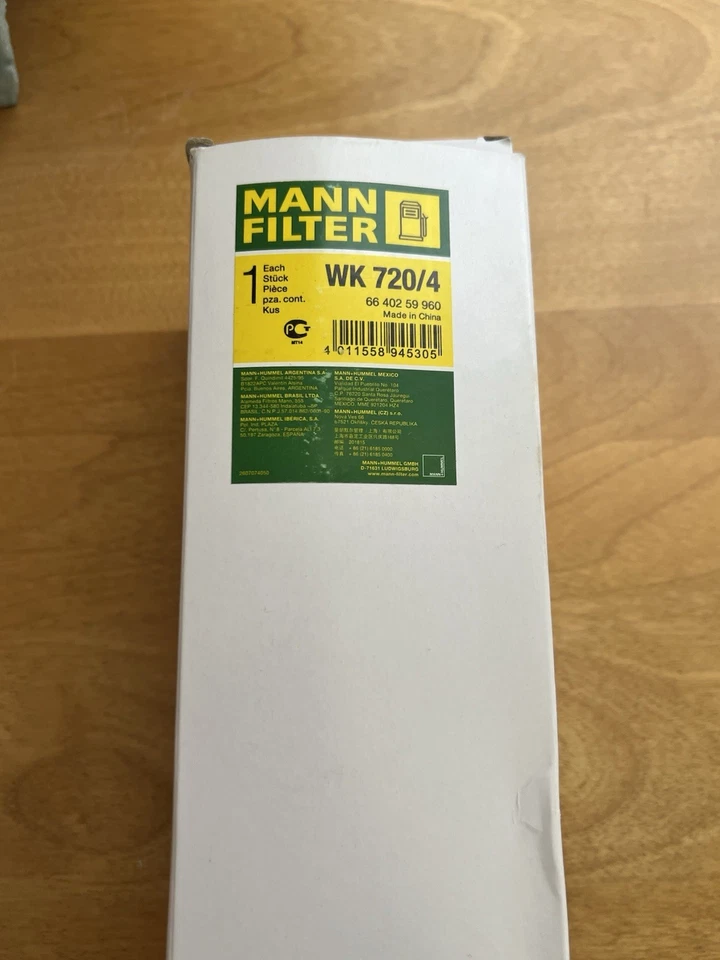 Filtro de combustible Mann OEM WK 720/4 para Audi A4 A6 A8 Quattro R8 RS4 S4 S6 S8 Foto 2 de 3