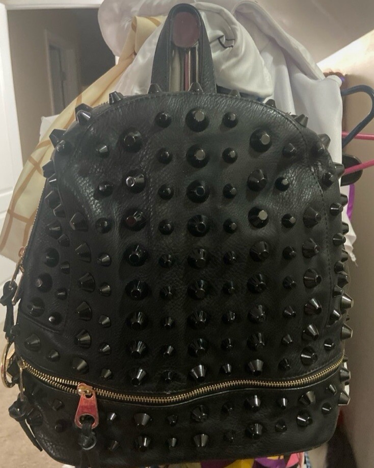 Traci Lynn Unisex Black Studded Plastic Backpack