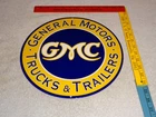 VINTAGE GMC GENERAL MOTORS TRUCKS +TRA 11 3/4" PORCELAIN METAL GASOLINE OIL SIGN