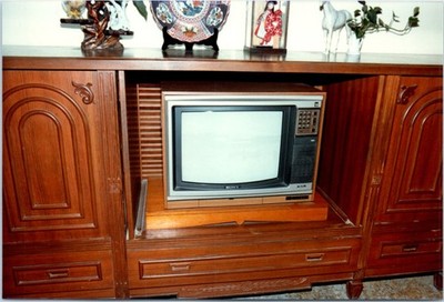 1980s Sony Trinitron TV in Wood Cabinet with Figurines Retro Home Vintage Photo