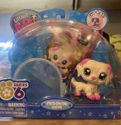 Littlest Pet Shop Golden Retriever Dog Pets On The Move 611 Clip N Go Pink White