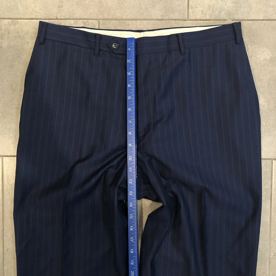 Pantalones de vestir Canali 1934 para hombre 34x29 azul lana Tessuto frente plano Italia Foto 3 de 4