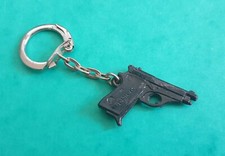 ANCIEN PORTE CLÉ / Mini pistolet révolver arme poing plastique / 1