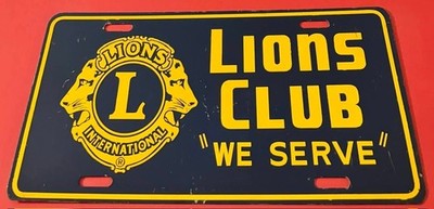 Vintage Lions Club We Serve Booster License Plate STEEL