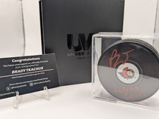 2025 Under Wraps NHL - Autographed Puck - Red Ink - Inscribed - Brady Tkachuk