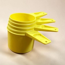 Vintage Tupperware Lemon Yellow Measuring Cups Set of 4 MCM