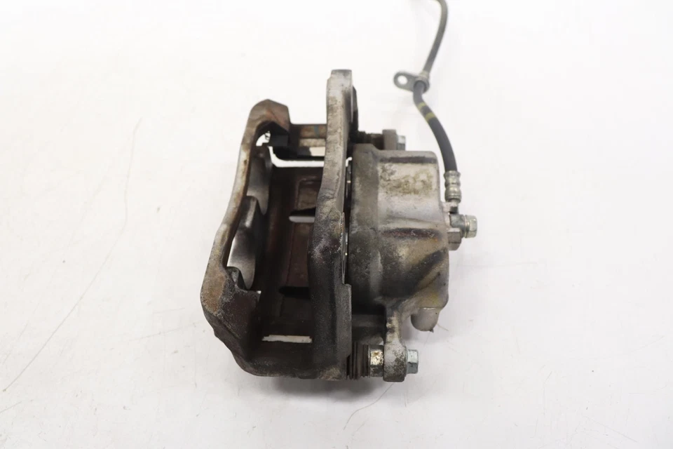 Pinza de freno de disco delantera izquierda Honda Odyssey 2018-2025 OEM Foto 2 de 4