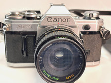 Canon AE-1 Film Camera: with 28 mm f2.8 wide angle lens Serviced  Tested 