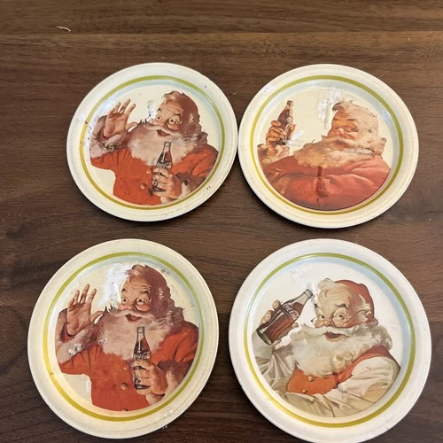 VINTAGE SET OF 4 SANTA CLAUS COCA COLA METAL COASTERS 3.5" 1983
